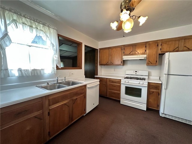 11637 State Route 85, Rayburn Twp, PA 16201 - kitchen featuring white appliances, under cabinet range hood, light countertops, brown cabinets, and dark carpet