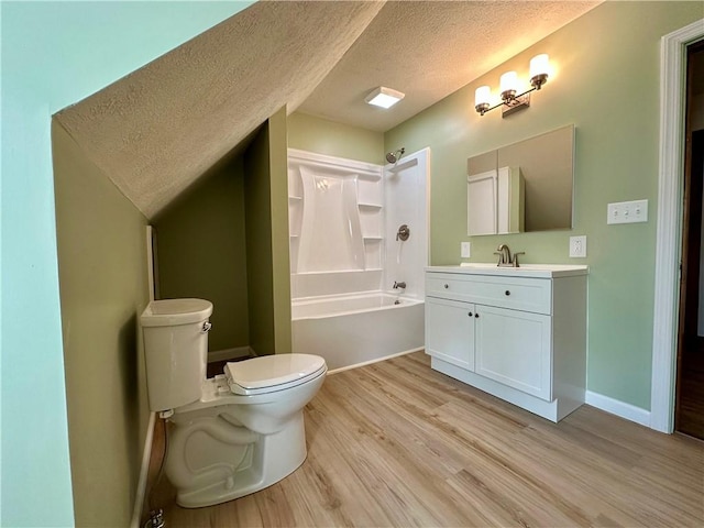 11637 State Route 85, Rayburn Twp, PA 16201 - bathroom featuring a textured ceiling, vanity, wood finished floors, and shower / bathtub combination