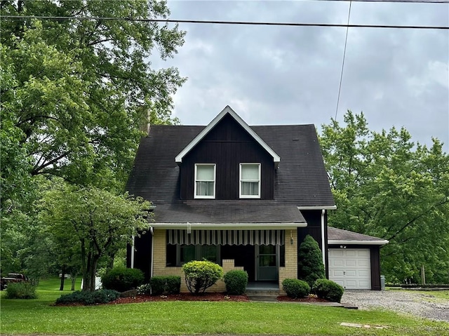 11637 State Route 85, Rayburn Twp, PA 16201 - view of front of home featuring a porch, a front yard, brick siding, and driveway