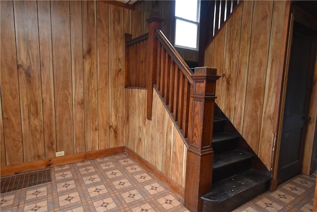 140 Saint Joseph St, Mount Oliver, PA 15210 - stairs featuring tile patterned floors and wood walls