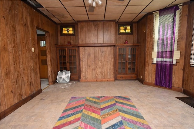140 Saint Joseph St, Mount Oliver, PA 15210 - unfurnished living room featuring wood walls and a drop ceiling