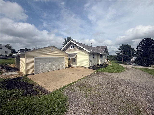 4352 Ellwood Rd, Wayne Twp Law, PA 16101 - view of side of property featuring an outdoor structure and a garage
