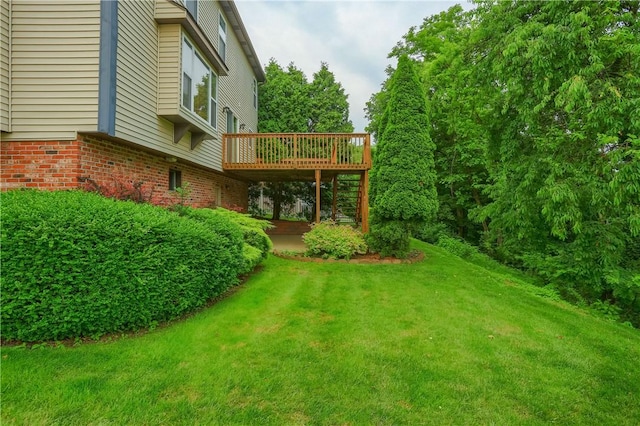 135 Jarod Dr, Moon/Crescent Twp, PA 15108 - view of grassy yard featuring a wooden deck