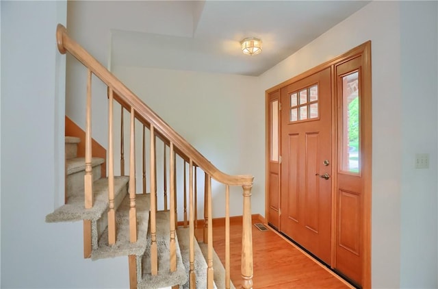 135 Jarod Dr, Moon/Crescent Twp, PA 15108 - foyer entrance featuring stairway and wood finished floors