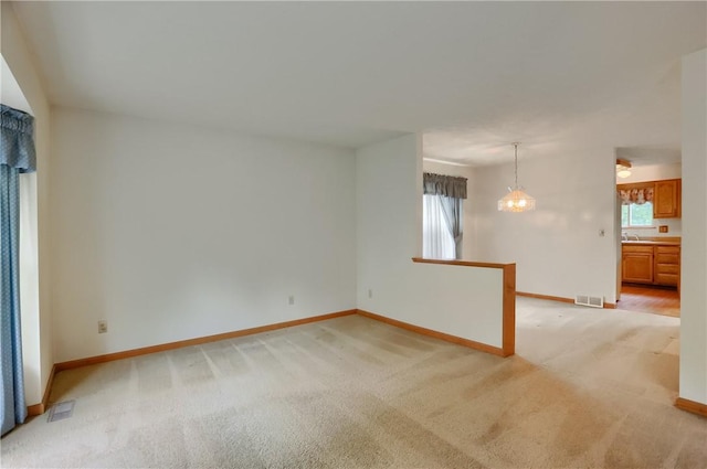 135 Jarod Dr, Moon/Crescent Twp, PA 15108 - empty room with light colored carpet