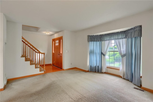 135 Jarod Dr, Moon/Crescent Twp, PA 15108 - carpeted entryway with baseboards and stairs