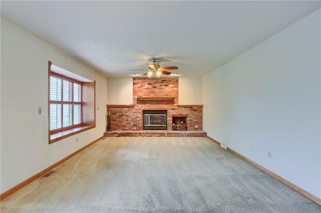 135 Jarod Dr, Moon/Crescent Twp, PA 15108 - unfurnished living room featuring a ceiling fan, carpet floors, and a brick fireplace