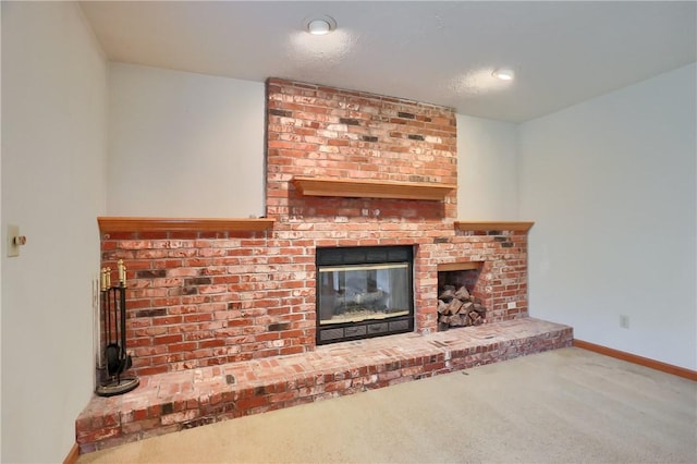 135 Jarod Dr, Moon/Crescent Twp, PA 15108 - unfurnished living room featuring carpet and a fireplace