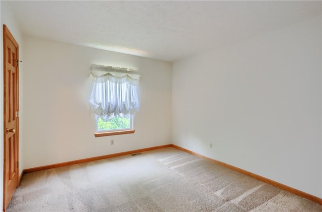 135 Jarod Dr, Moon/Crescent Twp, PA 15108 - unfurnished bedroom with light colored carpet