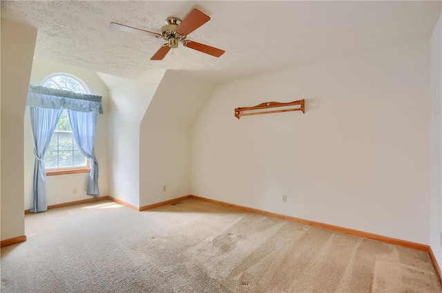 135 Jarod Dr, Moon/Crescent Twp, PA 15108 - additional living space featuring light carpet, ceiling fan, and lofted ceiling