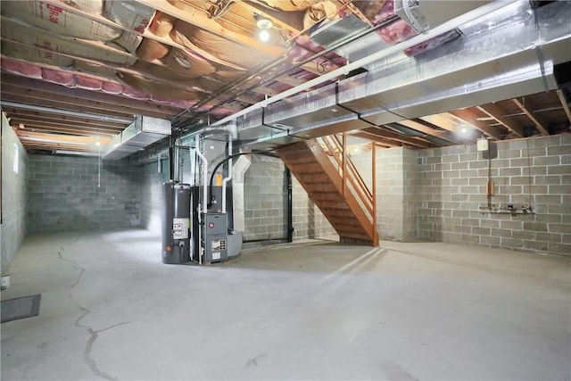 135 Jarod Dr, Moon/Crescent Twp, PA 15108 - unfinished below grade area with water heater, stairs, and heating unit
