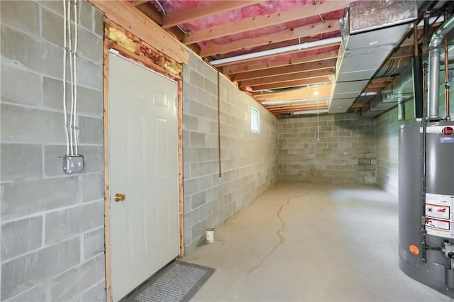 135 Jarod Dr, Moon/Crescent Twp, PA 15108 - unfinished basement featuring gas water heater and concrete block wall