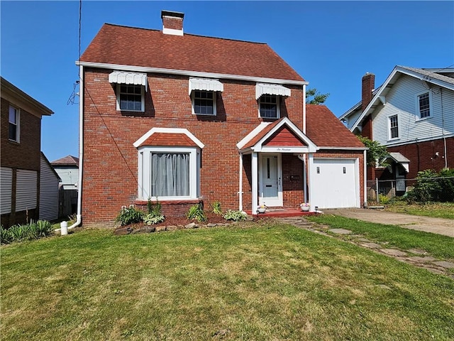 619 Ridge Ave, New Kensington, PA 15068 - colonial house with brick siding, a chimney, concrete driveway, and a shingled roof