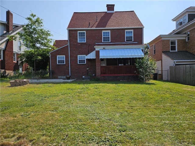 619 Ridge Ave, New Kensington, PA 15068 - back of property with brick siding and a chimney