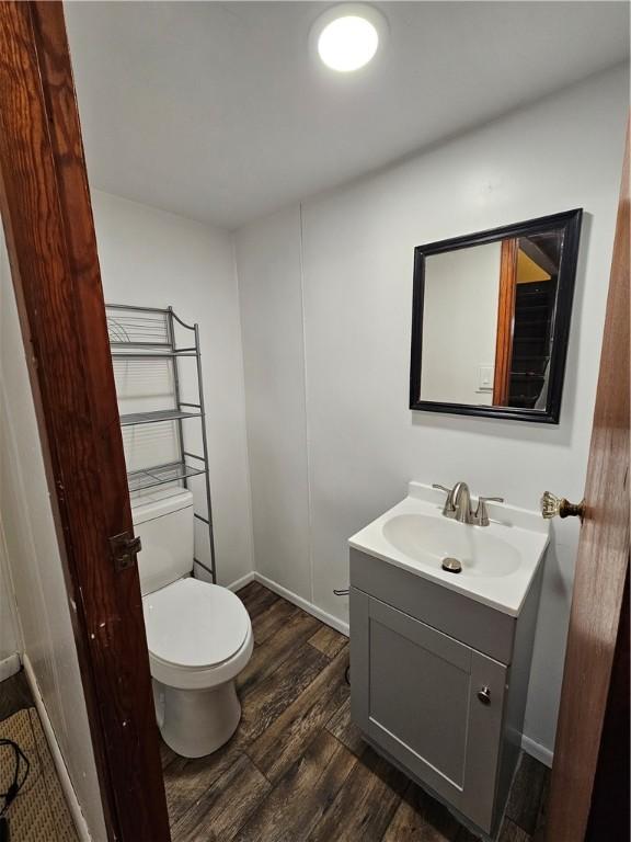 619 Ridge Ave, New Kensington, PA 15068 - bathroom featuring vanity and wood finished floors