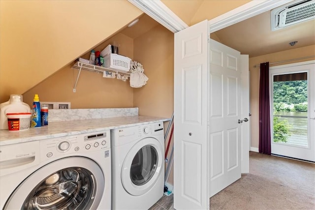 548 Penn St, Verona, PA 15147 - laundry area with washer and dryer and light carpet