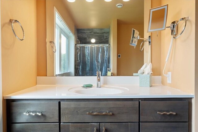 548 Penn St, Verona, PA 15147 - bathroom with vanity and an enclosed shower