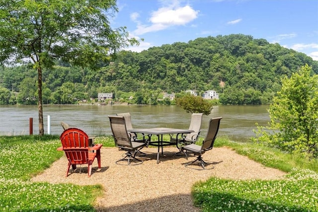 548 Penn St, Verona, PA 15147 - view of patio / terrace featuring a view of trees and a water view