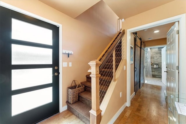 548 Penn St, Verona, PA 15147 - entrance foyer with healthy amount of natural light, stairs, and a barn door