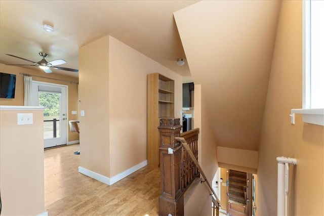 548 Penn St, Verona, PA 15147 - hallway with an upstairs landing and wood finished floors