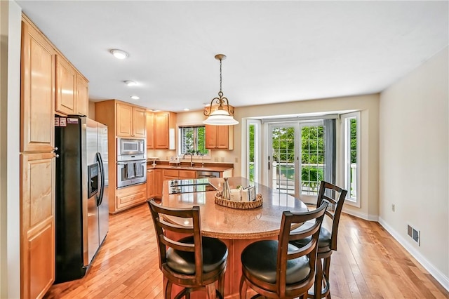 11504 N Shore Dr, Conneaut Lake Cra, PA 16316 - dining room with light wood-style flooring, healthy amount of natural light, and recessed lighting