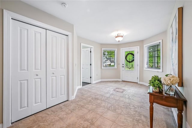 11504 N Shore Dr, Conneaut Lake Cra, PA 16316 - foyer entrance with baseboards and light tile patterned floors