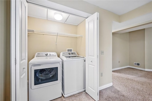11504 N Shore Dr, Conneaut Lake Cra, PA 16316 - washroom with separate washer and dryer and carpet