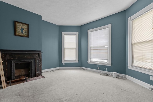 330 Jefferson Ave, City Of Washington, PA 15301 - unfurnished living room with carpet flooring and a fireplace with flush hearth