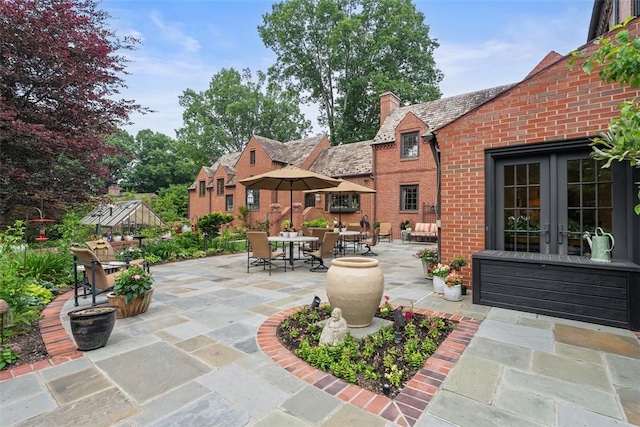 1909 Highgate Rd, Upper St Clair, PA 15241 - view of patio with french doors and outdoor dining area