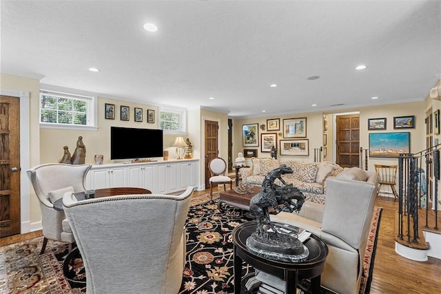 1909 Highgate Rd, Upper St Clair, PA 15241 - living area with wood finished floors, recessed lighting, and ornamental molding