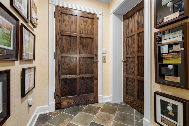 1909 Highgate Rd, Upper St Clair, PA 15241 - foyer entrance with stone tile flooring and baseboards