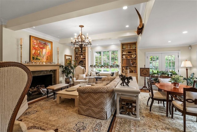 1909 Highgate Rd, Upper St Clair, PA 15241 - living area with a premium fireplace, crown molding, recessed lighting, a chandelier, and french doors
