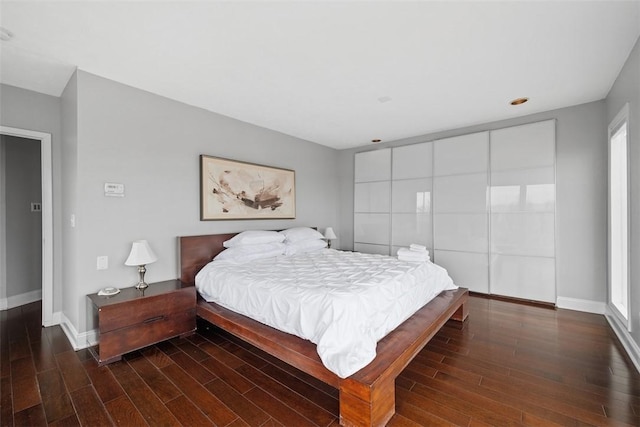 310 Cola St, Mt Washington, PA 15203 - bedroom featuring dark wood-type flooring and baseboards