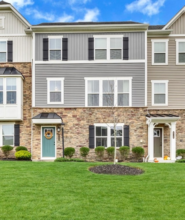 620 Amarth Ln, Cranberry Twp, PA 16066 - multi unit property featuring stone siding, a front yard, and board and batten siding