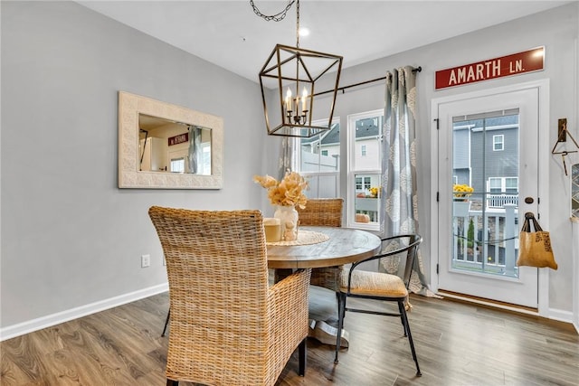 620 Amarth Ln, Cranberry Twp, PA 16066 - dining room with a chandelier and wood finished floors