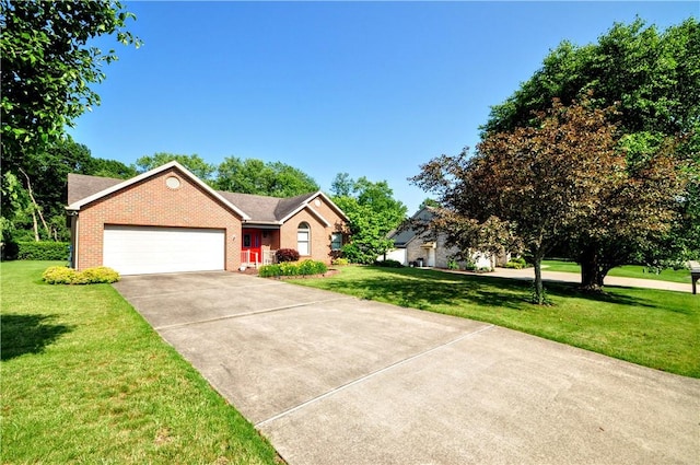 23 Naples Dr, North Union Twp, PA 15401 - ranch-style home featuring a front yard, brick siding, a garage, and concrete driveway