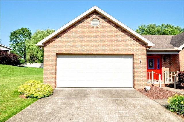 23 Naples Dr, North Union Twp, PA 15401 - view of front facade featuring concrete driveway, brick siding, a front lawn, a garage, and roof with shingles