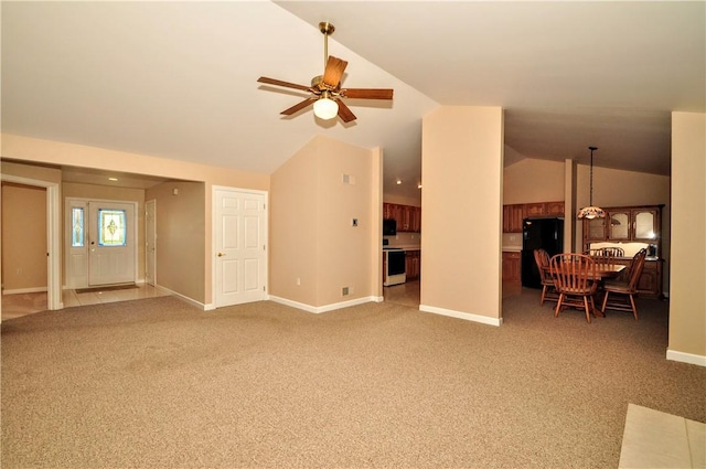 23 Naples Dr, North Union Twp, PA 15401 - unfurnished living room featuring vaulted ceiling, a ceiling fan, and light carpet