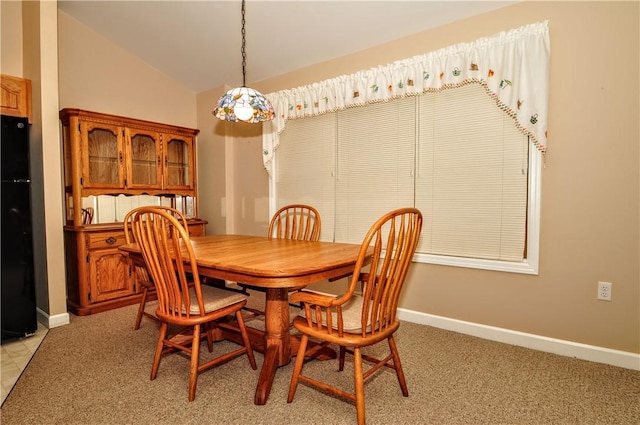 23 Naples Dr, North Union Twp, PA 15401 - dining area with lofted ceiling and baseboards