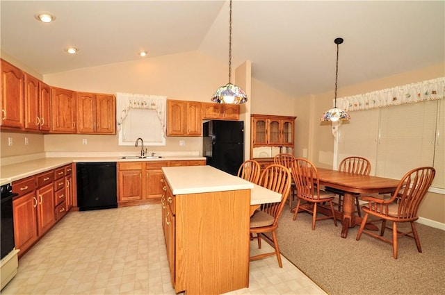23 Naples Dr, North Union Twp, PA 15401 - kitchen featuring black appliances, lofted ceiling, light flooring, a center island, and a kitchen bar