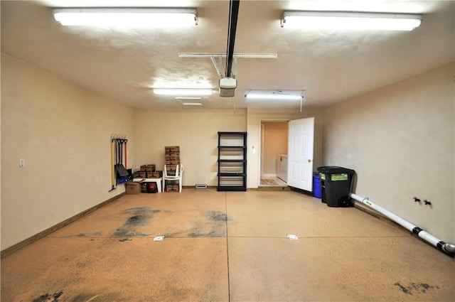 23 Naples Dr, North Union Twp, PA 15401 - garage with a garage door opener and baseboards