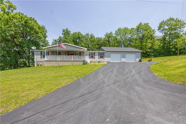 182 Bankhead Rd, Smithfield, PA 15478 - view of front facade featuring a porch, driveway, a garage, and a front lawn