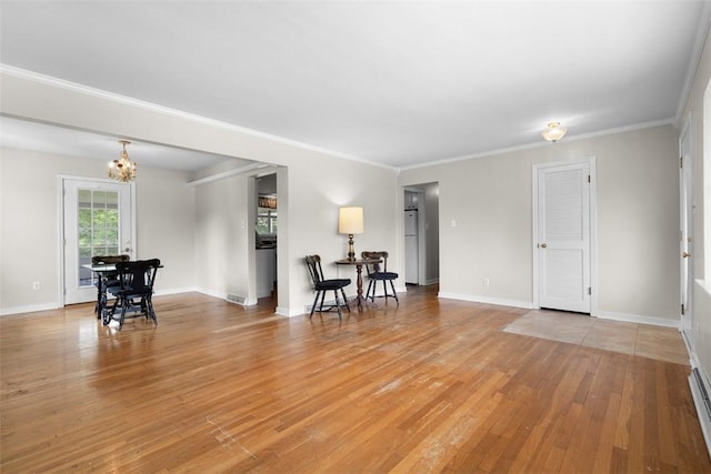 95 Karen Dr, Buffalo Twp Wsh, PA 15301 - living area featuring light wood-type flooring, a chandelier, and ornamental molding