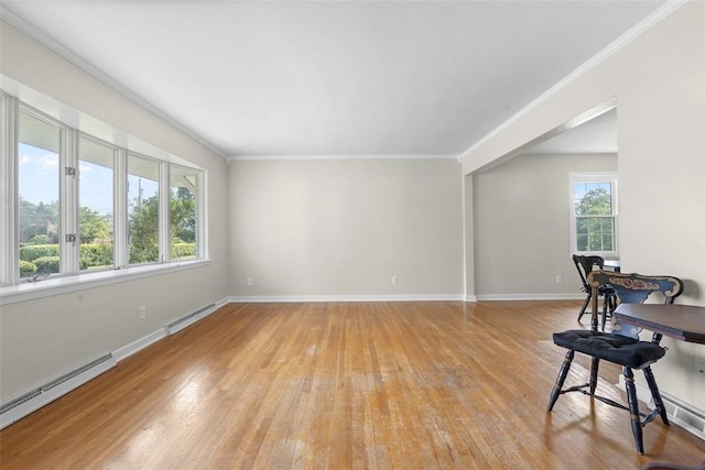 95 Karen Dr, Buffalo Twp Wsh, PA 15301 - unfurnished living room featuring a baseboard heating unit, light wood finished floors, and crown molding