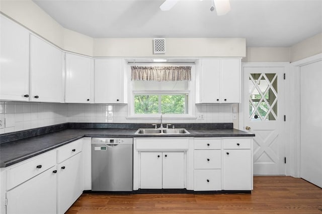 95 Karen Dr, Buffalo Twp Wsh, PA 15301 - kitchen with stainless steel dishwasher, dark countertops, and dark wood finished floors
