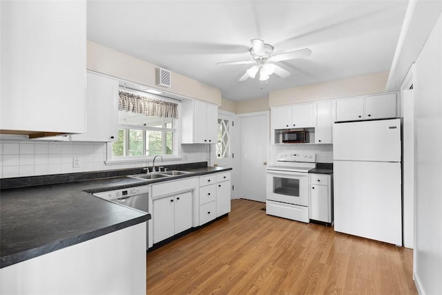 95 Karen Dr, Buffalo Twp Wsh, PA 15301 - kitchen with appliances with stainless steel finishes, dark countertops, ceiling fan, and white cabinetry