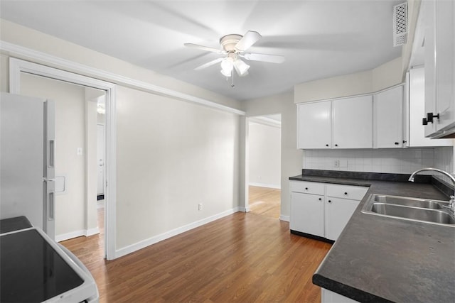 95 Karen Dr, Buffalo Twp Wsh, PA 15301 - kitchen featuring freestanding refrigerator, dark countertops, wood finished floors, and a ceiling fan