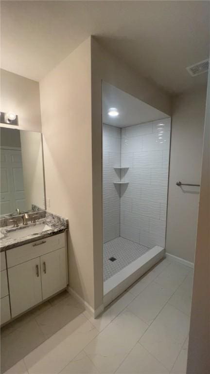 150 Shady River Blvd Unit 56A, Economy, PA 15005 - full bath with vanity, a walk in shower, and marble look tile flooring
