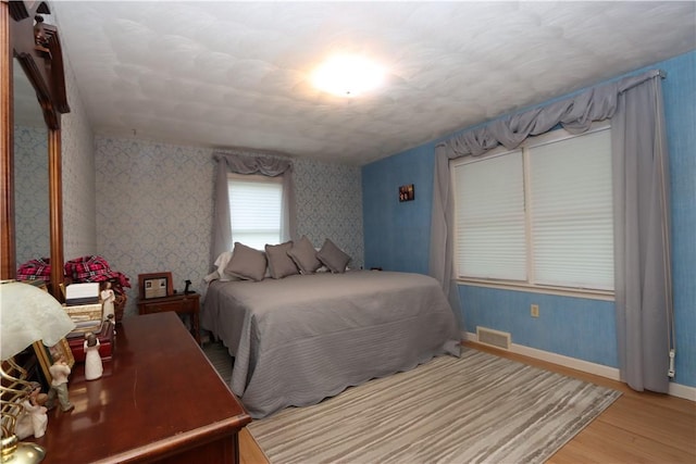 3244 37th St, Chippewa Twp, PA 15010 - bedroom featuring light wood-style floors and wallpapered walls