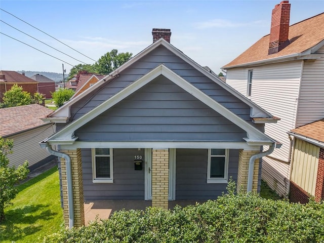 150 Frank St, Whitaker, PA 15120 - back of property featuring a porch and a chimney
